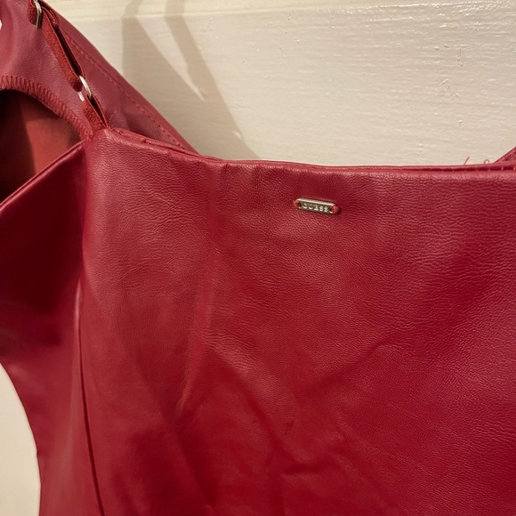 Guess Faux leather Bodysuit. Varios L, and XL . - Picture 4 of 10